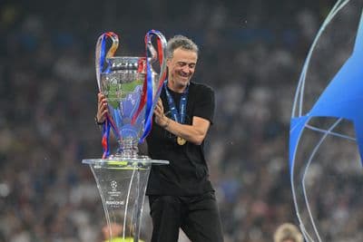 PSG coach Luis Enrique with the Champions League trophy
