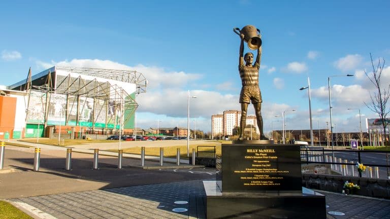 Celtic FC in Glasgow. Billy McNeill statue holding cup in the air